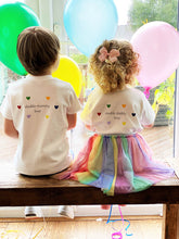 Load image into Gallery viewer, back-of-two-children-wearing-matching-white-double-daddy-love-kids-LGBTQ+tshirt-with-rainbow-hearts--one-of-the-items-from-the-adoption-clothing-range-from-notafictionalmum
