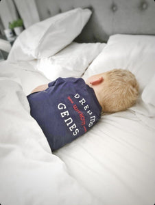 toddler-sleeping-matching-family-pyjama-set-navy-checked-white-bedding