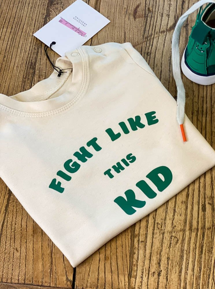 Fight-like-this-kid-baby-toddler-tshirt-green-slogan-one-of-the-items-from-the-adoption-clothing-range-from-notafictionalmum
