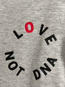 LOVE NOT DNA babygrow