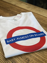 Load image into Gallery viewer, baby-almost-on-board-underground-baby-badge-white-vegan-t-shirt
