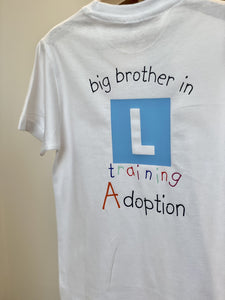 big-brother-big-sister-in-training-adoption-announcement-t-shirt-hanging