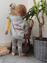 Load image into Gallery viewer, toddler-grey-baseball-jacket-yellow-teddy-green-plant
