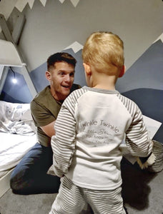dad-laughing-toddler-and-dad-toddler-bedroom-decor-kids-grey-striped-pyjamas