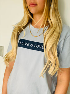 blonde-woman-wearing-love-is-love-tshirt-grey