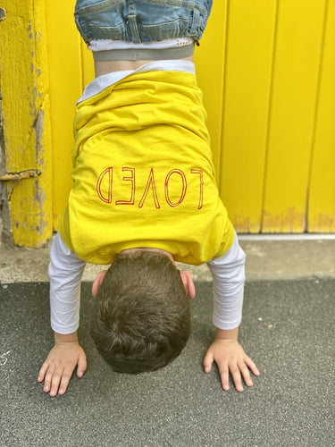 kid-handstnad-bright-yellow-loved-t-shirt-yellow-door