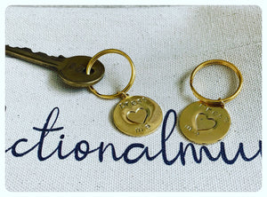 press-me-magic-button-keyring-gold-disc-handstamped-with-heart-keyring