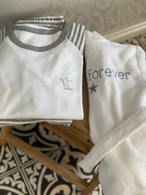 Load image into Gallery viewer, team-forever-kids-bathrobe-folded-with-white-grey-tshirt
